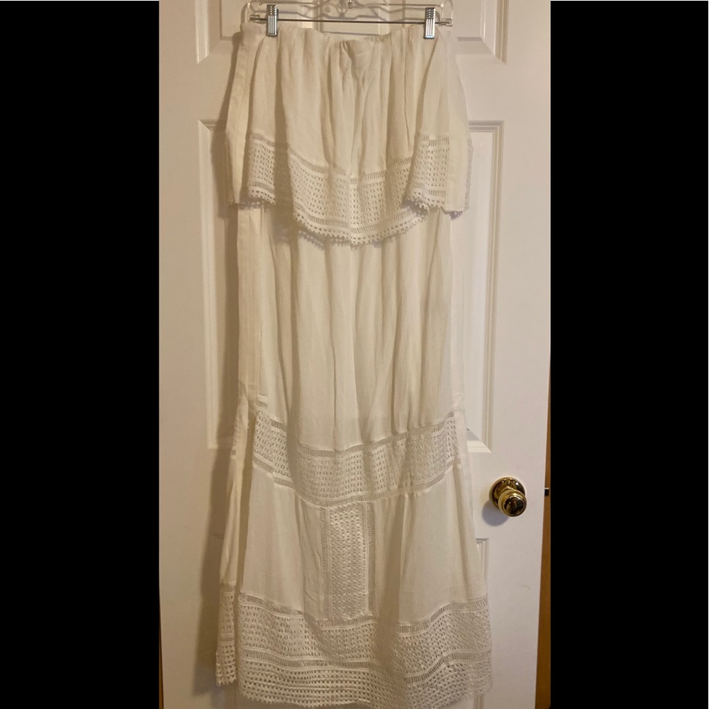 Colleen Lopez Strapless White Maxi Dress with Crochet Trim and side split.